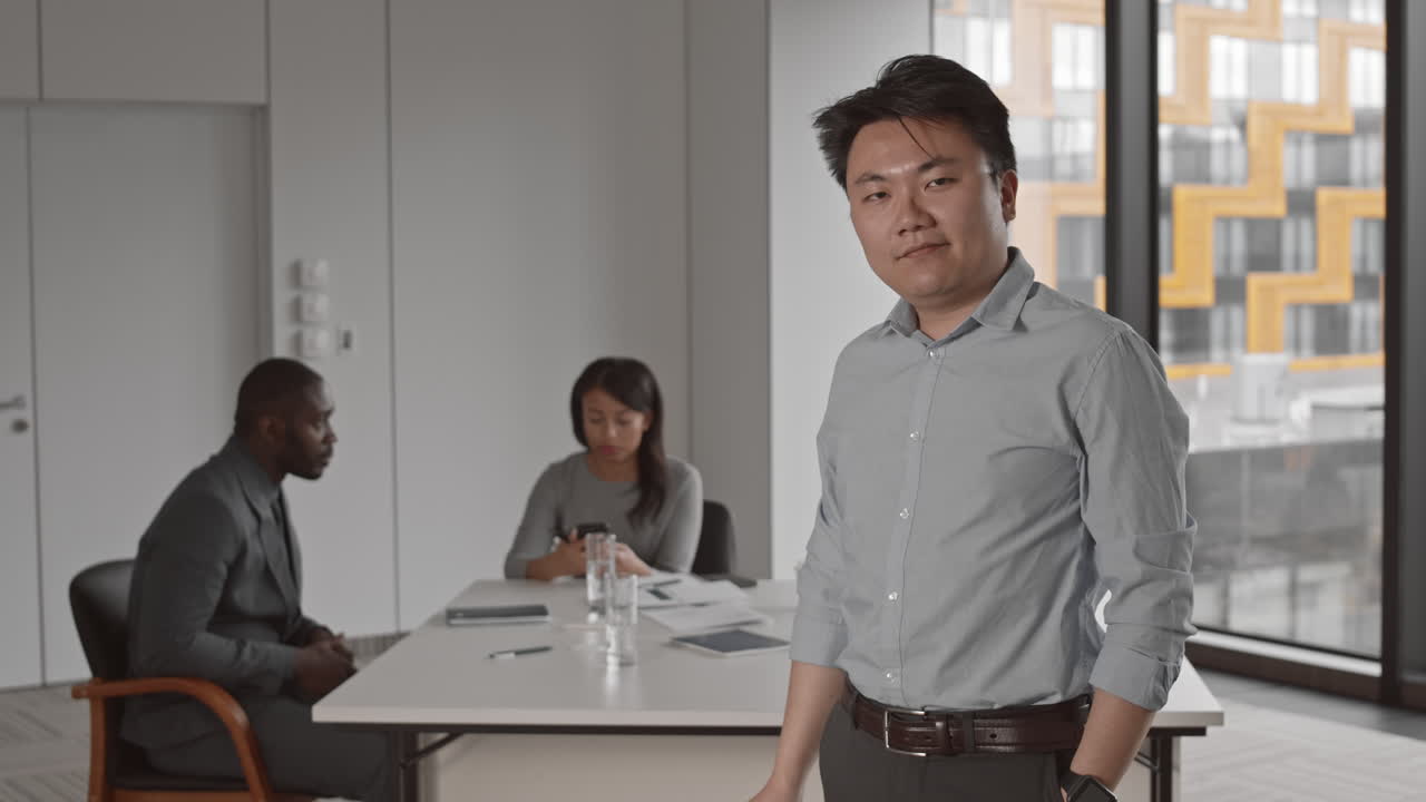 Portrait of Asian Businessman in Office