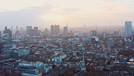 dolly-forward-aerial-drone-shot-towards-Angel-Islington-north-west-London-at-sunset