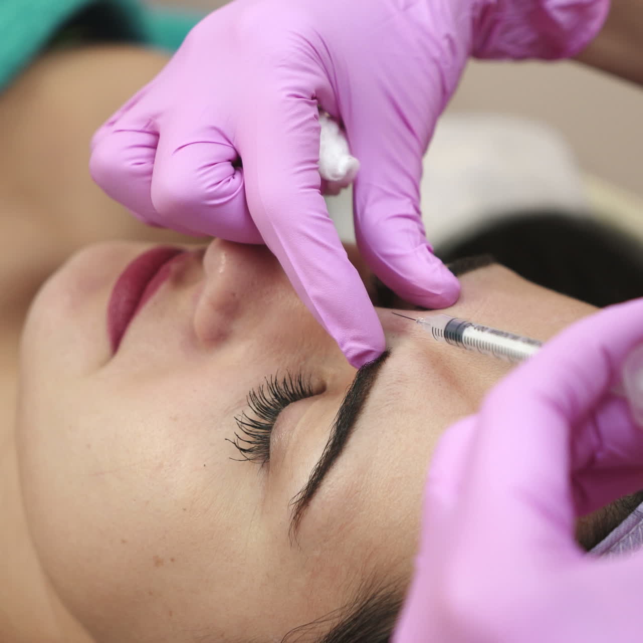 Receiving mesotherapy procedure, cosmetology. Beautician doing injection against aging for woman. Skincare concept.