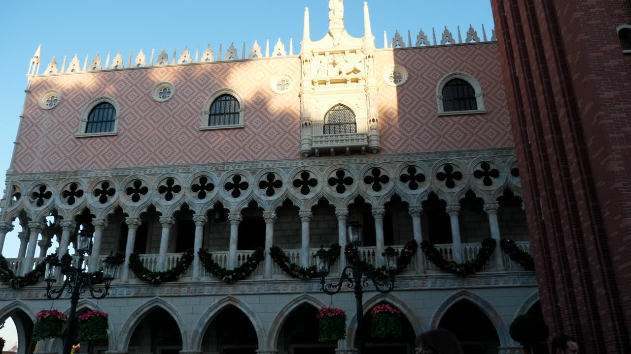 Italy pavilion replication in Disney World with blue skies and a crowd of people in Orlando Florida