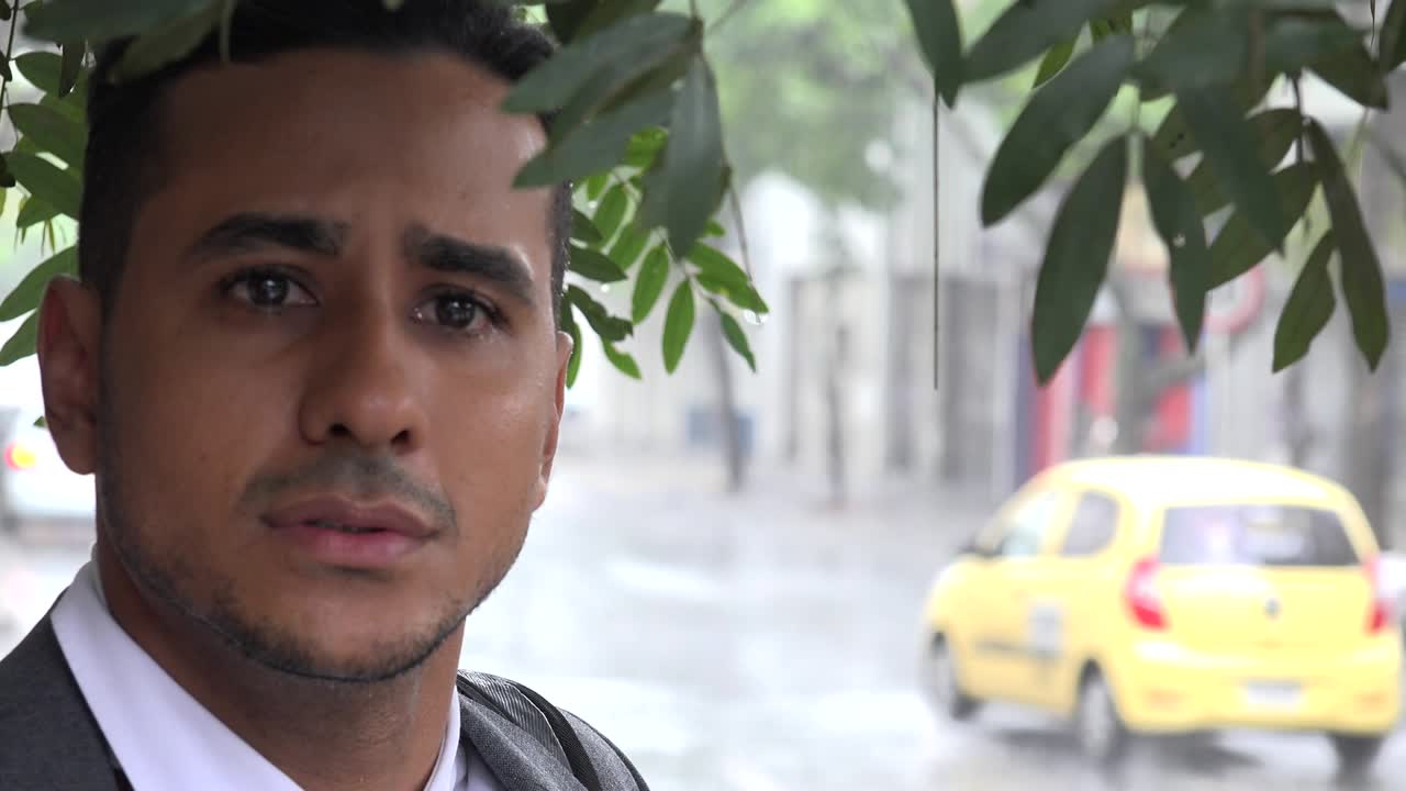 Concerned Business Man in Rain