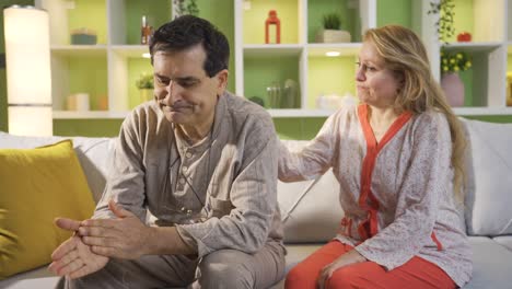 worried and sad couple depressed at home, frustrated.