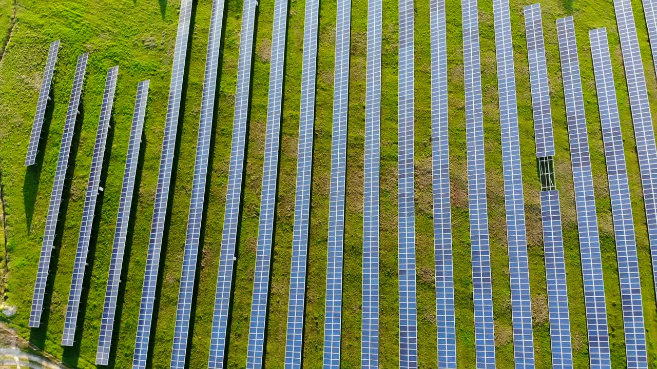 Aerial view industrial Photovoltaic solar units panels environment producing renewable green energy