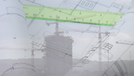 planos de construcción y un gobernante