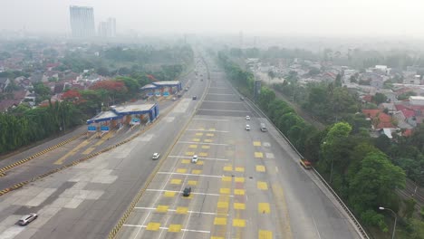 highway toll plaza in a suburban area