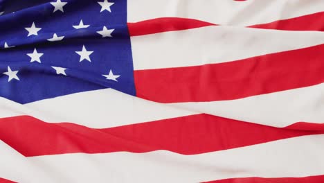 Close-up-of-national-flag-of-usa-with-stars-and-stripes-with-copy-space