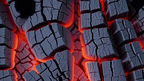 close-up view of glowing hot charcoal cubes