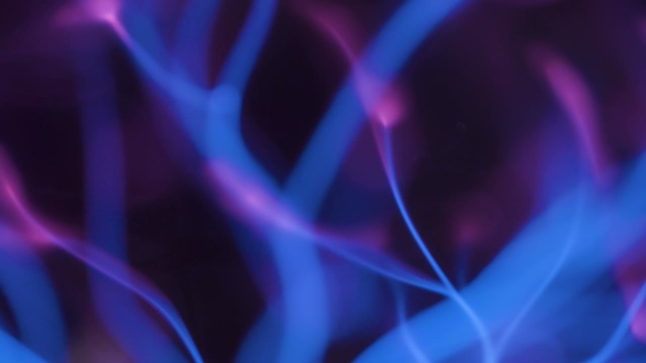 Ray of blue lights inside the plasma ball
