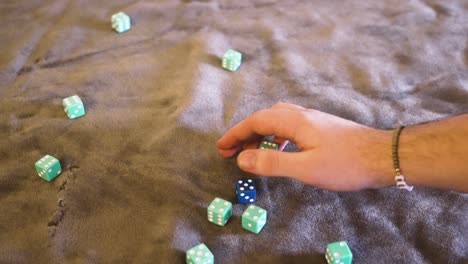 point of view, various blue dice being rolled