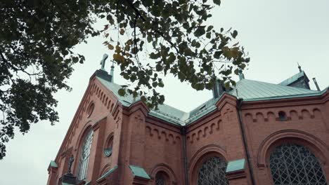 revealing-shot-of-old-stone-church