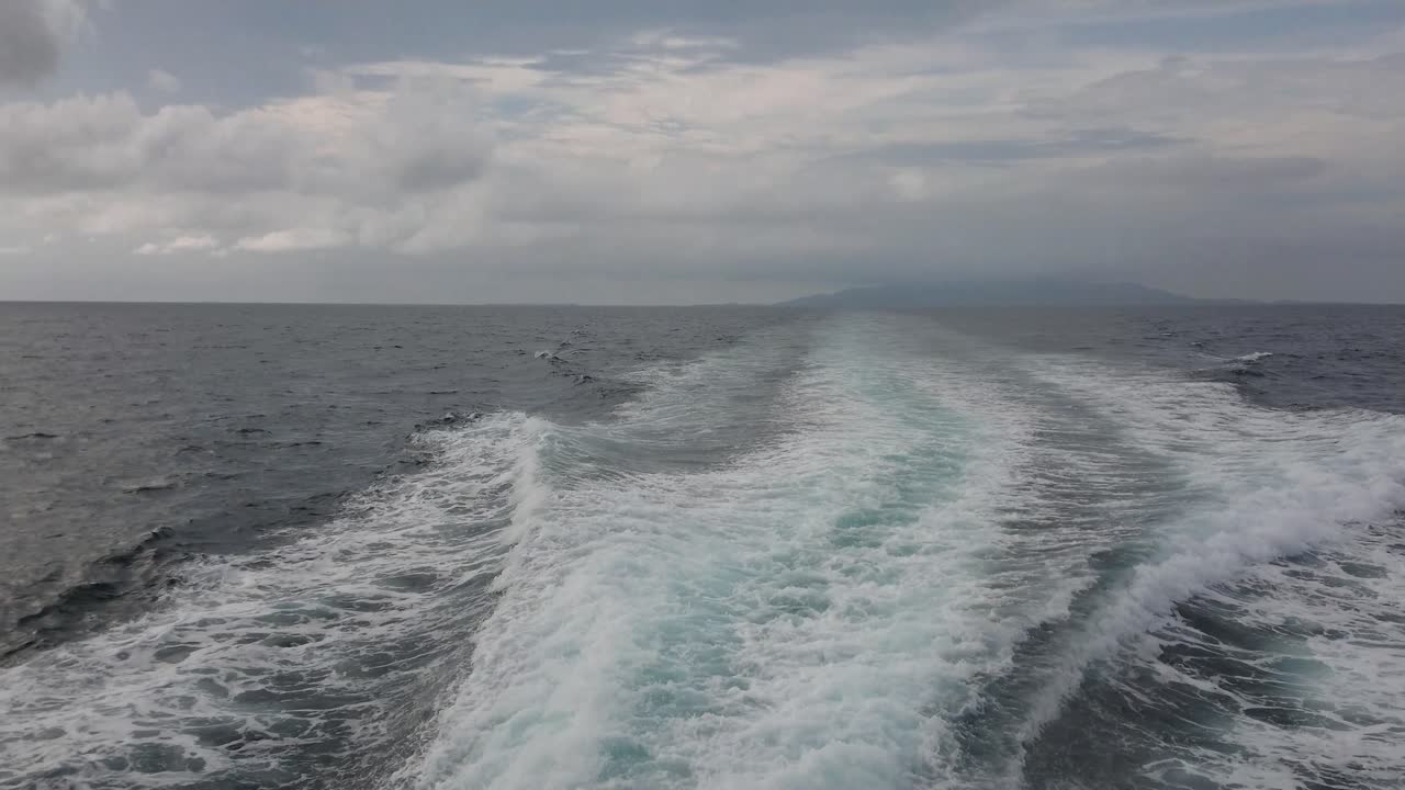 Waves caused by speed boats. Sea waves and foam because of motor boat or yacht, motion while boat moves.