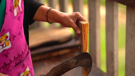 Woman-chopping-wood