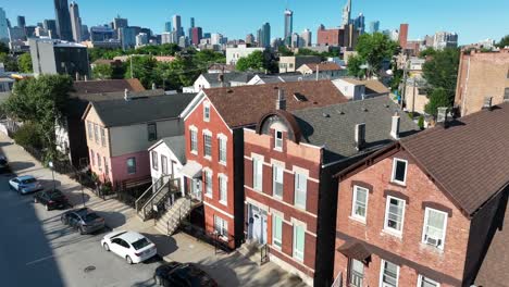 chicago residential street with traditional brick houses and city skyline in the background