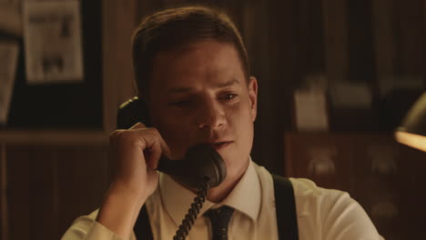 retro detective on vintage phone