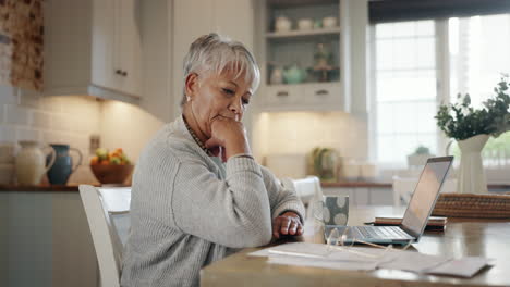 financial, stress and senior woman with laptop