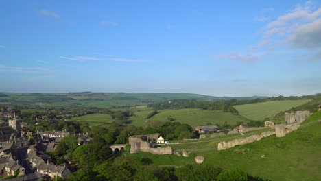 slow panning shot of corfe village and castle, isle of purbeck, dorset, england