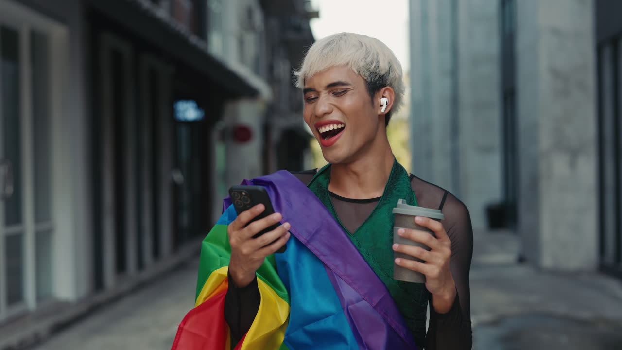 Person using a phone while enjoying coffee outside