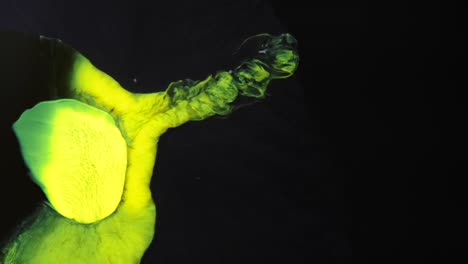 the physics of yellow and green on bold display in a black void - for more, search "abstractvideoclip" using the quotation marks