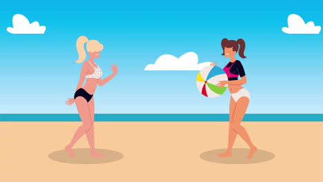 two women playing beach volleyball