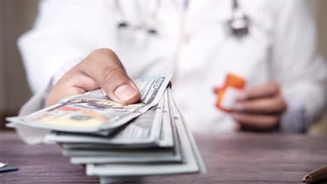 doctor accepting payment for medical services