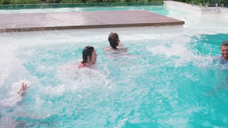 group of friends playing in water