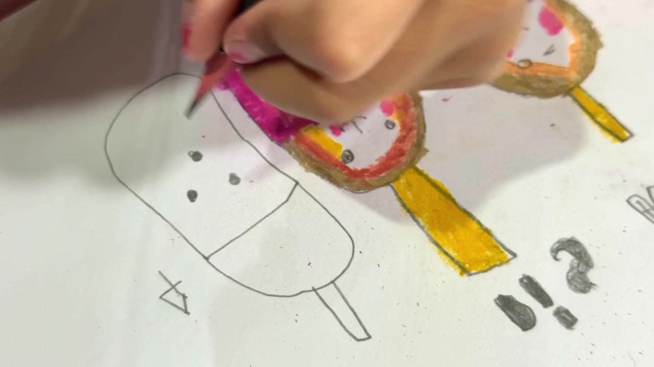child's hand drawing with pencil on paper, colorful lollipop illustration, kids creativity and art activity concept.