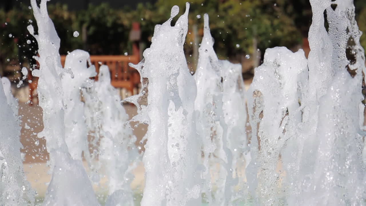 Water Fountain Sprays Water in Daytime