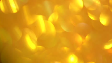 festive yellow background with sequins and rhinestones