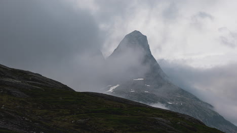 Clouds-And-Fog-Obscure-Peak-Of-Mountain-In-Norway-At-Early-Morning