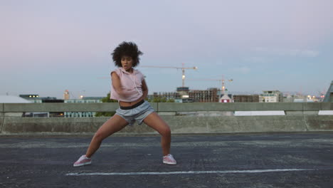 trendy female dancing practicing choreography