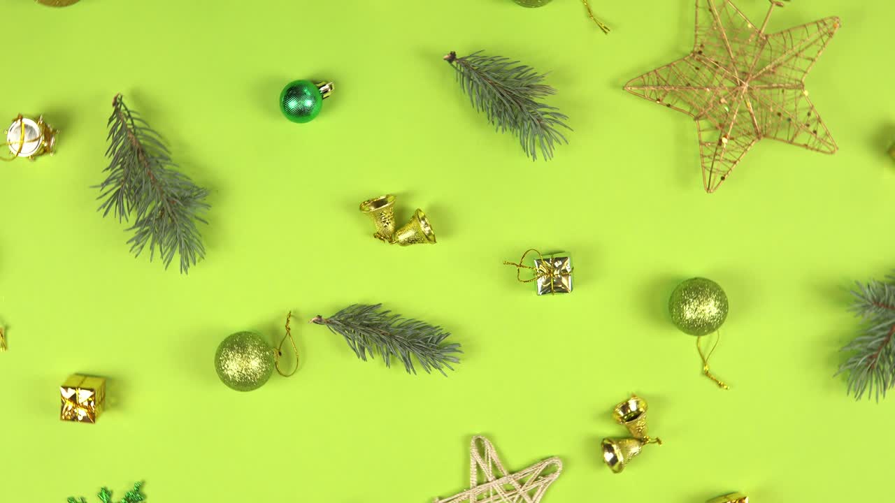 Christmas abstract pattern 360 degree rotation. Fir tree branches, cone and gift box spinning on green background