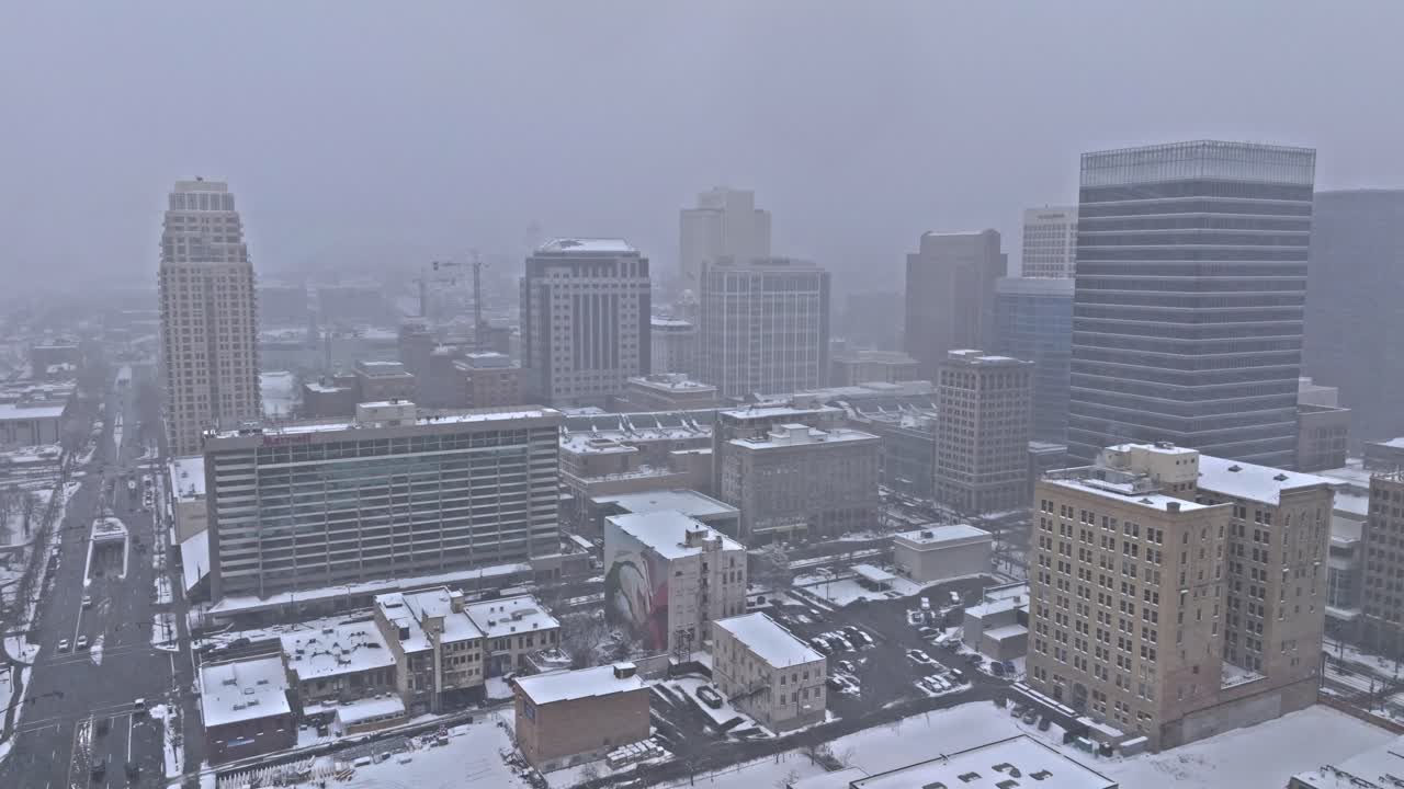 Misty Salt Lake City skyline on snowy winter's day, Utah