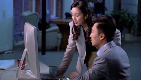 two colleagues of professional business people working together, coworkers gather in boardroom discuss ideas at briefing about investment portfolio, planning and analyzing strategies with client