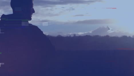 animación de glitch sobre hombre caucásico mirando el atardecer