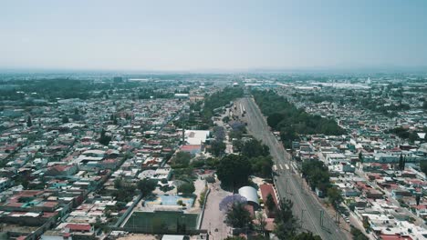 aerial view of drone landing at a train station in queretaro mexico