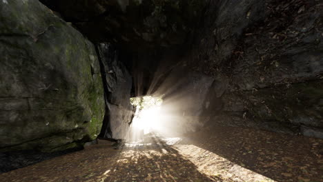 la luz del sol asomando a través de la entrada de una cueva rocosa