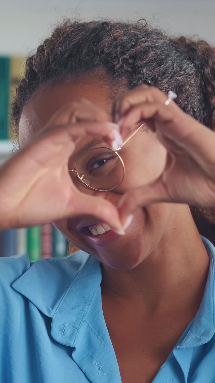 Capturing a joyful moment of a young woman in a cozy library setting