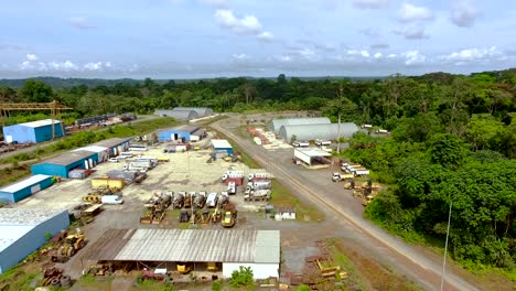 equatorial africa. aerial view of excavators and construction equipment in an industrial area.