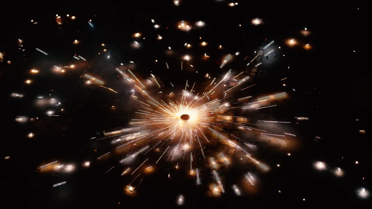 Cracker sparkles spinning isolated on a black background