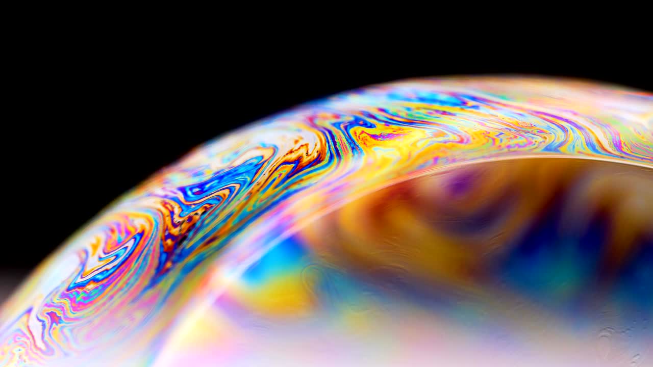 las colores del arco iris de las burbujas de jabón