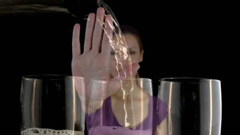 animation of glasses of champagne over caucasian woman on black background