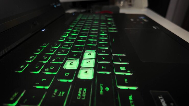 Close-up of a glowing RGB keyboard with WASD illuminated