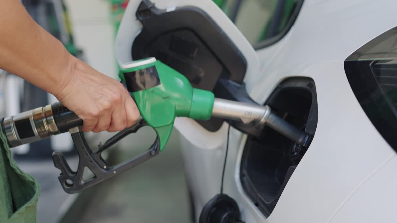 Filling up a car at a gas station