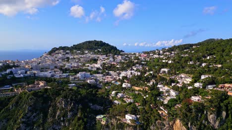 Houses-In-Anacapri-And-Mediterranean-Ocean-On-The-Island-Of-Capri,-Italy---aerial-drone-shot