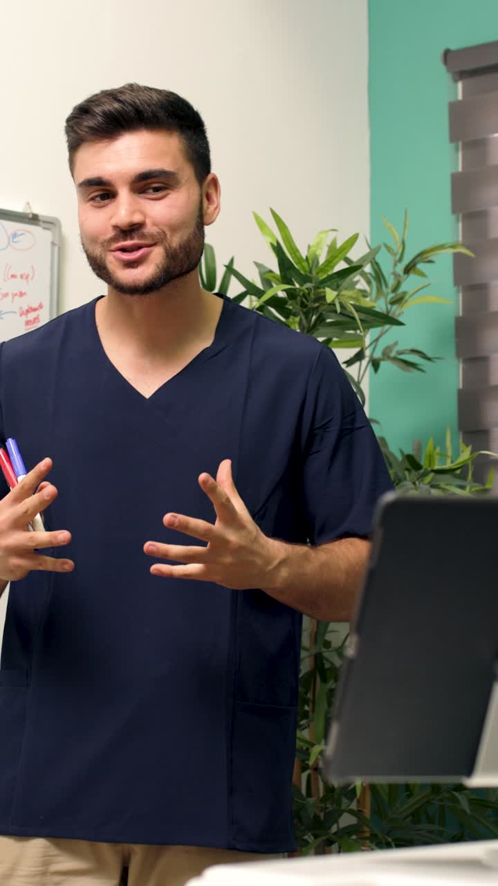 Young Medical Professional Talking and Gesturing During a Presentation