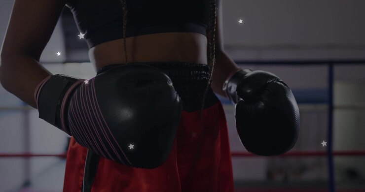 Boxeador ajustándose los guantes y arreglando las vendas en el ring mientras las estrellas se intensifican al chocar los guantes preparando el asalto