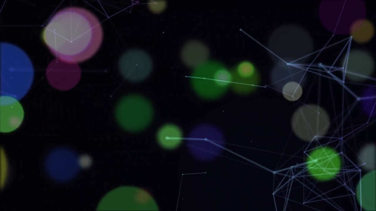 Multi color glowing spots against black background