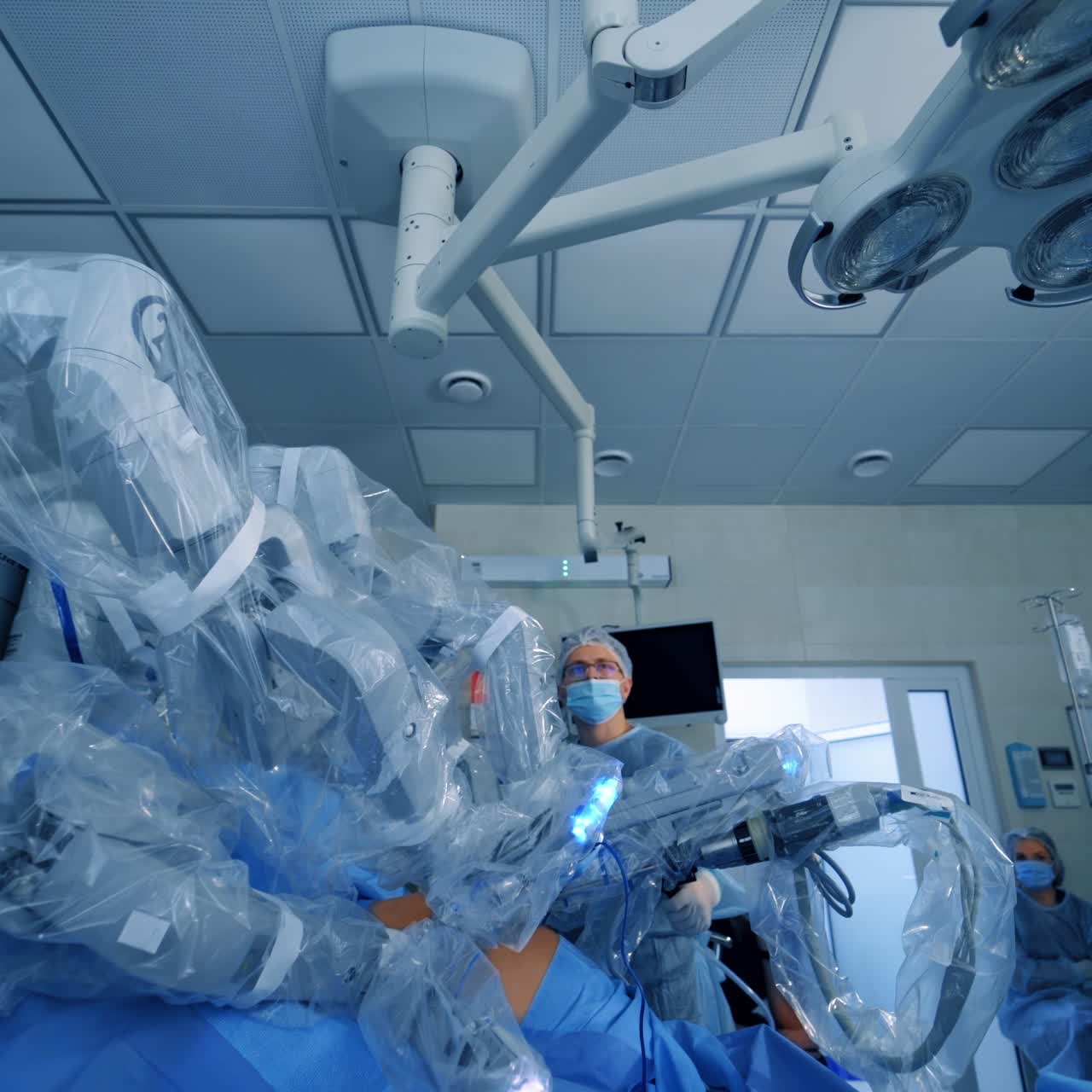 Surgeon in operating room. Minimal invasive surgical innovation, medical robot surgery with endoscopic. Neurosurgery concept.