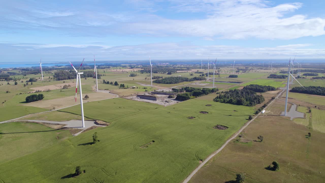 Explore the fascinating engineering and mechanics behind wind turbines with this aerial footage