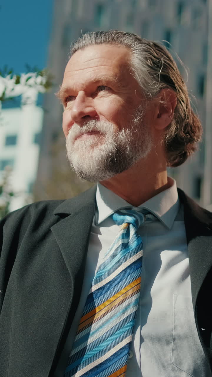 Happy Businessman Smiling at Camera Outdoors